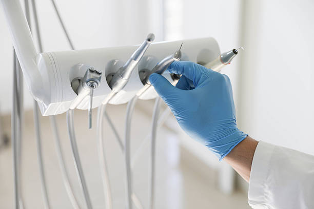 Professional Tooth Extraction technician working in Richmond, TX